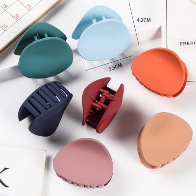 China Pretty New Fashional Fashion Candy Color Hair Claw Hollow Matte Hair Claw Clips For Korean Girls for sale