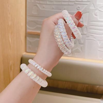 China High Quality Female Simple Matte Scrunchies Hair Tie Elastic Hair Band Rope Ring Band Rope Laser Circle Fashion Telephone Wiring Hair Scrunchies for sale