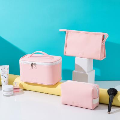 China Hot Sale 2021 Candy Color Makeup Bag Female Travel Cosmetic Bag Pu Cosmetic Bag Waterproof Dustproof Shockproof Hot Sale With Handle for sale