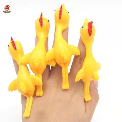 China Elastic Stretchy Flick Turkey Finger Slingshot Sticky Flying Chicken Kids Toys Small Toys for sale