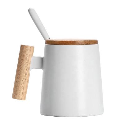 China Viable Success Wooden Handle Amazon Ceramic Coffee Mugs With Lid And Spoon Pure Color Mugs Cup Kitchen Tool Gift for sale