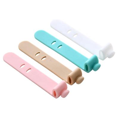 China 4PC Silicone Self-Locking Cable Strap Clips Line Wire Tie Reusable Data Cable Tie 2 Hole Beam Manager Wire Winder Holder Keeper Wire Organizer for sale