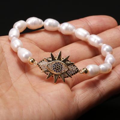 China TRENDY 24K Gold Plated Evil Eyes Mother of Pearl Beads Natural Freshwater Cultured Pearl Elastic Bracelets for sale