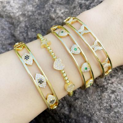 China 2022 Anti-allergic Fashionable Retro Style 18k Gold Plated Cubic Zircon Heart Butterfly Eye Cavity Bracelet Cuff for sale