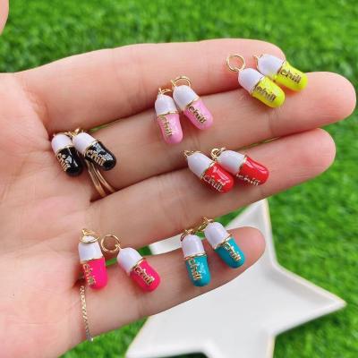 China TRENDY 24k Gold Plated Enamel Colorful Micro Paved CZ Cute Cold Pill Pendant Charms For Jewelry Making for sale