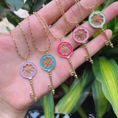 China FASHIONABLE Women Jewelry Trendy Design 24K Gold Plated Colorful Cavity Enamel Flower Key Charm Pendant For Necklace Making for sale