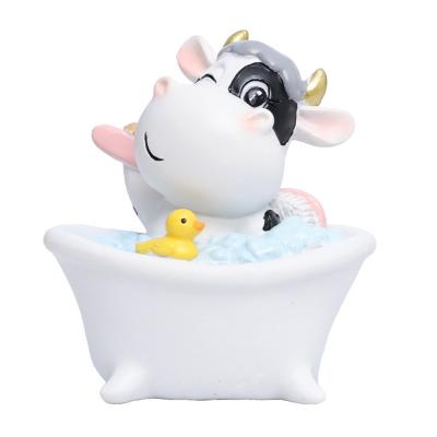 China Cute Europe Cartoon Cow Figurine Toy For New Year Gift Decoration Creative Home Resin Figure Cow Figurine Animal Model for sale