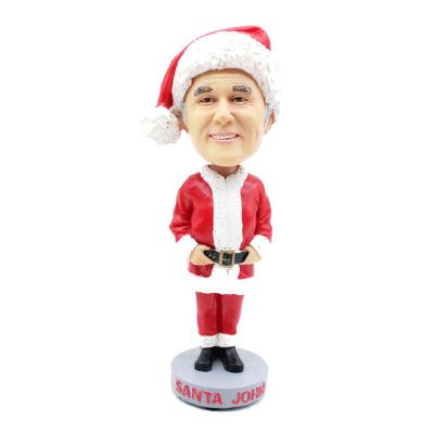 China Custom Europe OEM Stock Number Supplier Polyersin Figurine Opens Resin Santa Claus Bobble Head Figurine for sale