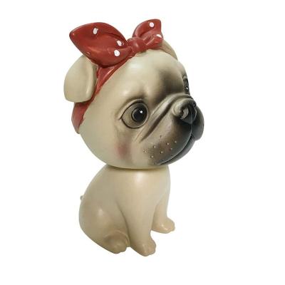 China Funny Flip Animal Puppy Head Bobbleheads Cute Flip Head Dog Dashboard Resin Car Pug Bobbleheads Europe Gift for sale