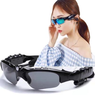 China Kind Two Lens Blue Tooth Earphone Shades Lens Microphone Portable Wireless Sports Polarized Smart Sunglasses for sale