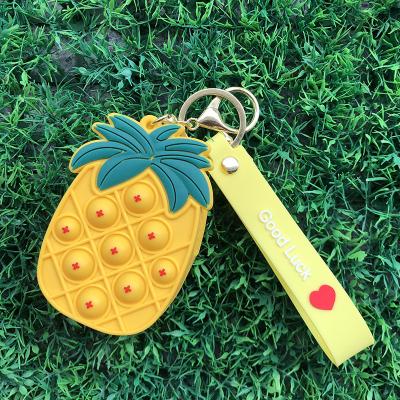 China New design latex fidgety person noise silicone purse OEM logo kids accessories custom cute non-toxic silicone pop key chain for sale