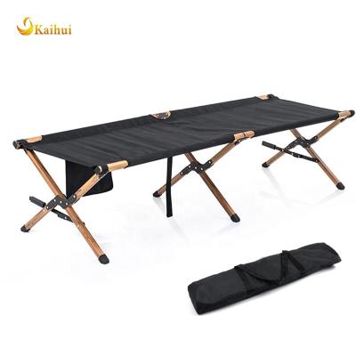 China Portable Cradle Modern Folding Camping Outdoor Camping Cot With Carry Bag Camp Wood Grain Cradle For Adults for sale