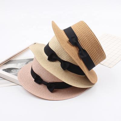 China Dobby Fashion Parent-child Beach Sun Bow Women Straw Hat Panama Handmade Straw Hat for sale