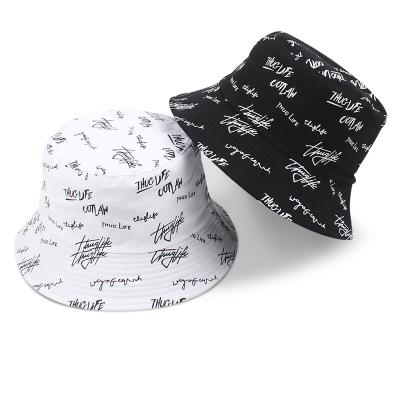 China Fashion\Comfortable\Durable Reversible Bulk Bucket Hat For Girls One Whole Side Printing Another Side Embroidery Custom Logo for sale