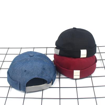 China Wholesale COMMON Adjustable Hot Round Skull Retro Streetwear Fashion Sale Brimless Brimless Hat for sale