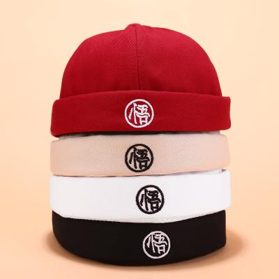 China COMMON hip hop streetwear with you skull hat cotton rolled simple preppy skull embroidery style brimless hat men for sale