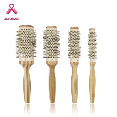 China Super Paddle Sizes 4 Round Blow Brush Ceramic Barrel Bamboo Handle Drying Roll Thermal & Ionic Styling Hair Brush for sale