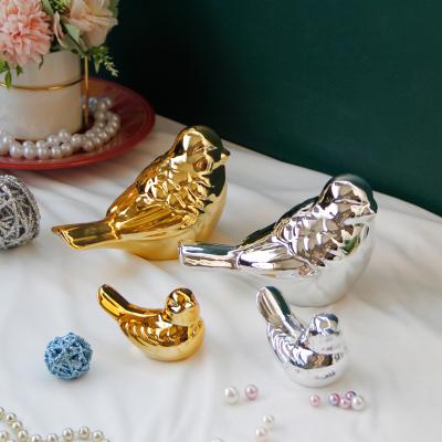 China Beautiful China Amazon Hot Sale Ceramic Craft Porcelain Gold Silver Bird Shape Art Craft For Home Decoration and Gifts for sale