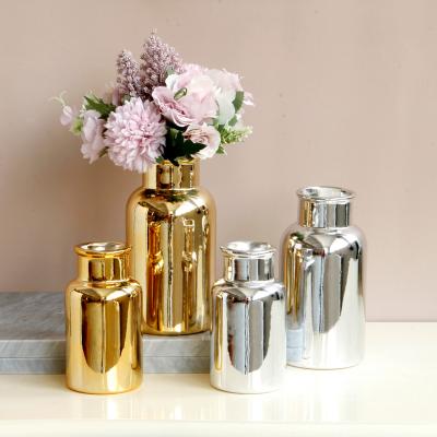 China Tough 2021 Hot New Ceramic Luxury Plating Flower Vase Office Living Room Porcelain Gold Silver Gold Vases For Home Decor for sale