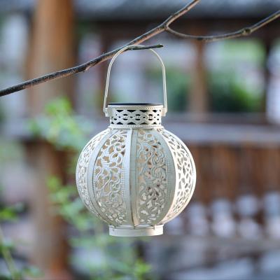 China Garden Outdoor Waterproof Decorative hand Solar Garden Lights Lanterns Hallow Retro Hanging Metal Solar Lantern for sale