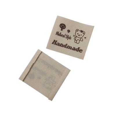 China Sustainable Cartoon Label Custom Kids Woven Labels for sale