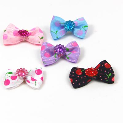 China Viable Dog Hair Bows with Elastic Bands for Small Puppy Yorkie Teddy Hair Grooming Accessories Dogs Cats Bun Headdress for sale