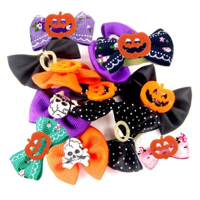 China Halloween Viable Cat Hair Bows Puppy Grooming Dog Bows Hair Accessories With Elastic Bands for sale