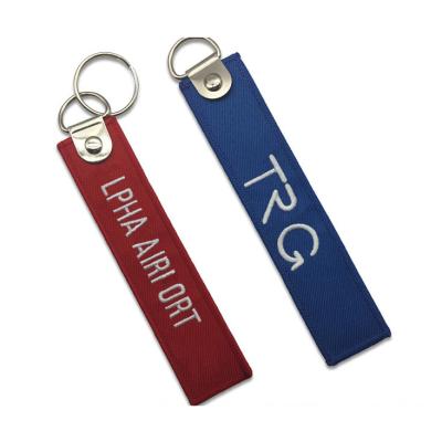 China Customized Durable Quick Lasting Customized Souvenir Embroidery Logo Fabric Promotional Gift Woven Key Chains for sale