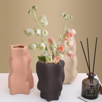 China Nordic Minimalist Irregular Ceramic Vase Desktop Art Morandi Vase Creative Pink Ceramic Decoration Living Room for sale