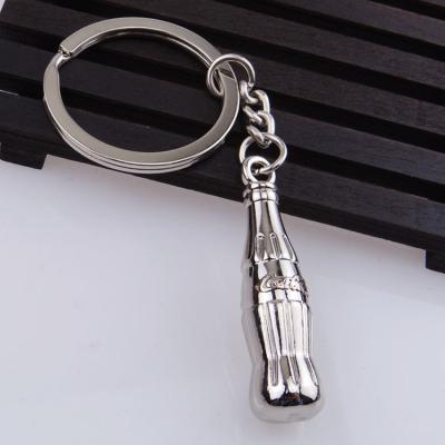 China Creative Cola Bottle Key Chain Fashion Small Car Key Chain Pendant Accessories Metal Key Chain Gifts for sale