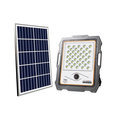 China High Quality Eco-friendly Solar Camera Light No TF Card 730lm Die Casting Aluminum Outdoor Led Solar Flood Light for sale