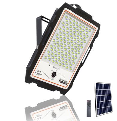 China 100W Eco-friendly Solar Flood Light With 16G Cheap Price IP65 Camera Outdoor Solar Camera Light for sale