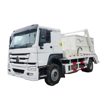 China Hotels most popular howo 4x2 hydraulic swing arm roll garbage truck 10cbm pop up lifting trash can vehicle for sale for sale