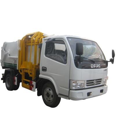 China Dongfeng wholesale newest price hotels small size light duty side load garbage garbage truck for sale from China factory Te koop