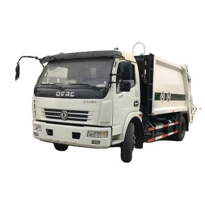 China China DFAC 8m3 garbage compactor truck for hotels 5 ton compactor garbage truck en venta