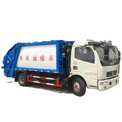 China China DFAC 8m3 garbage compactor truck for hotels 5 ton compactor garbage truck price Te koop