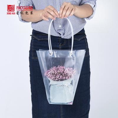 China ANTISTATIC Dust Protect Clear PVC Tote Bag For Shopping Flower Wine Cake Food Carrier Tote Bag for sale