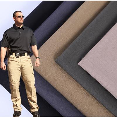 China Khaki Military Ripstop TC 65/35 Soft Cotton Waterproof Shrink-Resistant Polyester Fabric For Tactical Pants for sale