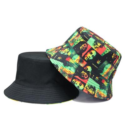 China Custom hip-hop personality men's double-side-wear bucket hat new graffiti American character Europe and Sun hat for sale