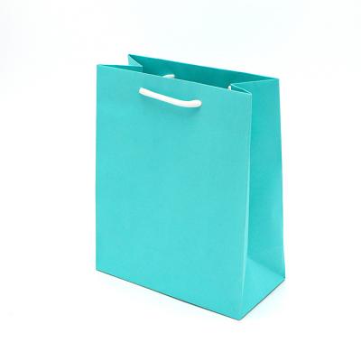 China Recyclable custom logo thick paper jewelry packaging bag blue recycled kraft paper bag paper shopping bag for sale