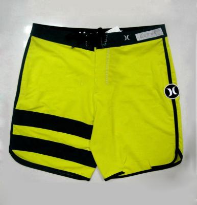 China Anti-UV 4 Way Mens Spandex Shorts Beach Wear Shorts Laser Sealed Pocket And Seam for sale