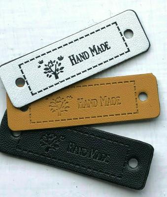 China Garment Shoes PU Leather Labels Velcro Backing Shrink Proof for sale