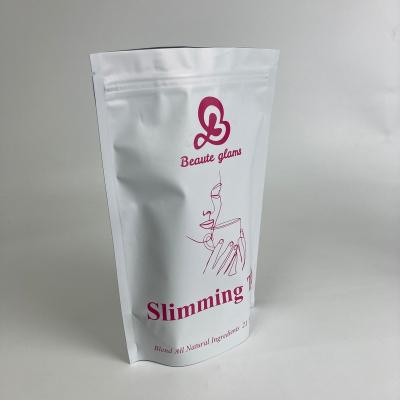 China Disposable Custom Printed Stand Up Zipper Bags For Slimming Tea With Tear Notch for sale