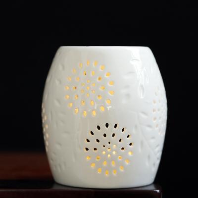 China Cutout Wholesale AROMATIC Oval Design Ceramic Oil Burner Used With Essential Oil Candle And Wax Melts for sale