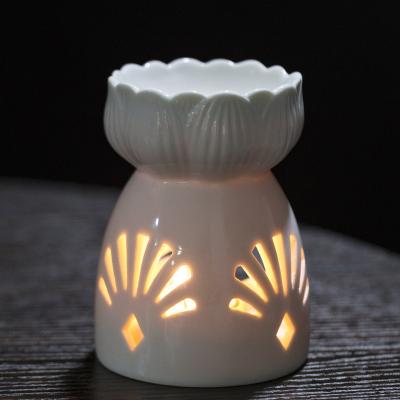 China Hollow AROMATIC Ceramic Essential Oil Burner Aroma Candle Holder Tealight Wax Melt Burner for SPA Aromatherapy for sale