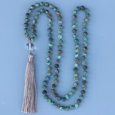 China Vintage Customized Design 6mm Matte African Turquoise Beads Knotted Necklace With Tassels Crystal Ball Women Mala Jewelry Clear Pendant for sale