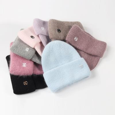 China Guan Linglong New OEM Design JOINT Metal Label Knitted Cool Knitted Hat Winter Fashion Wool Beanie Hat for sale