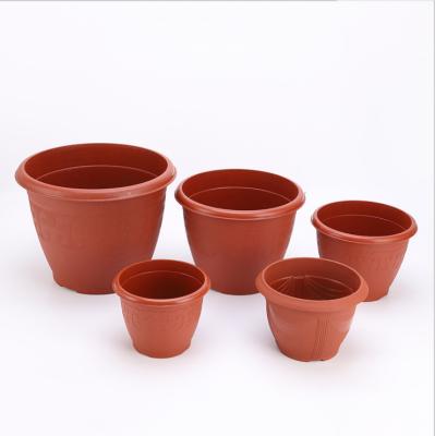 China CLASSIC Red Plastic Automatic Absorption Flowerpot Water Relief Breathable Thickened Flower Pot for sale