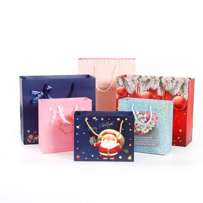 Cina Recyclable Manufacturers Customized Paper Bags Wedding Pink Deli Shop Cardboard Paper Gift Shopping Bags Specially With Ribbon in vendita