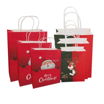 Cina Recyclable Small Kids Christmas Paper Gift Bags 2020 Christmas Gift Small Paper Bag in vendita